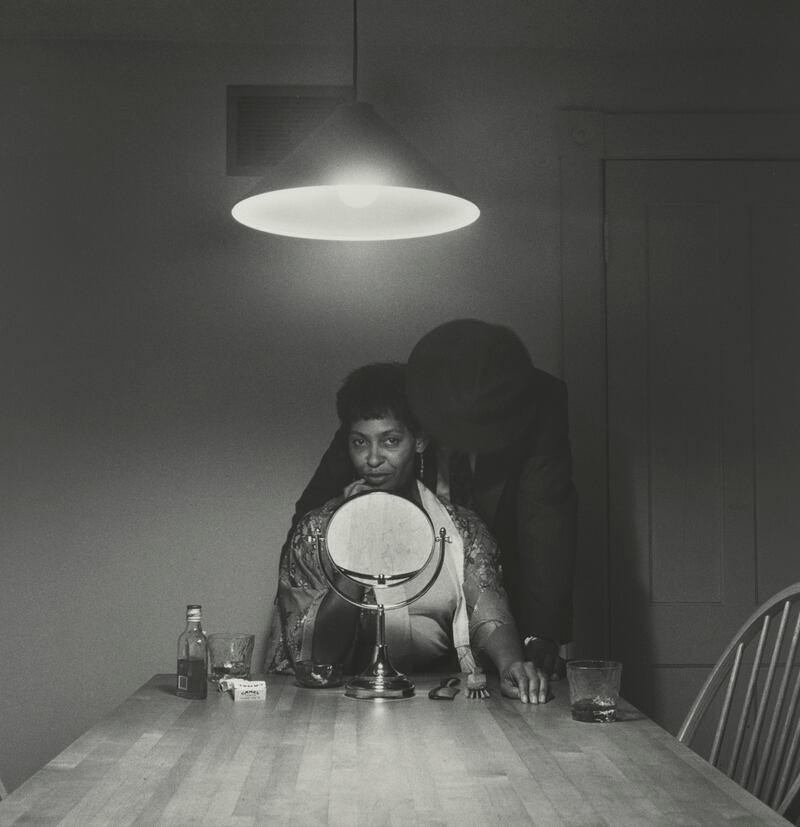galleries/2014/01/30/carrie-mae-weems-retrospective-at-the-guggenheim-photos/carrie-mae-weems-guggenheim-kitchentablemanwoman_clx1vn