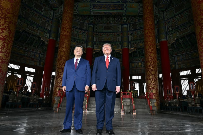 China's President Xi Jinping (L) and US President Donald Trump visit the Temple of Heaven in Beijing on May 14, 2026.
