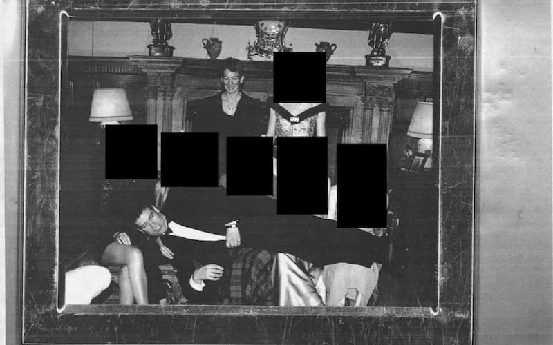 Then-Prince Andrew is pictured in a heavily-redacted photo released as part of the "Epstein files" by the U.S. Department of Justice on December 19, 2025.