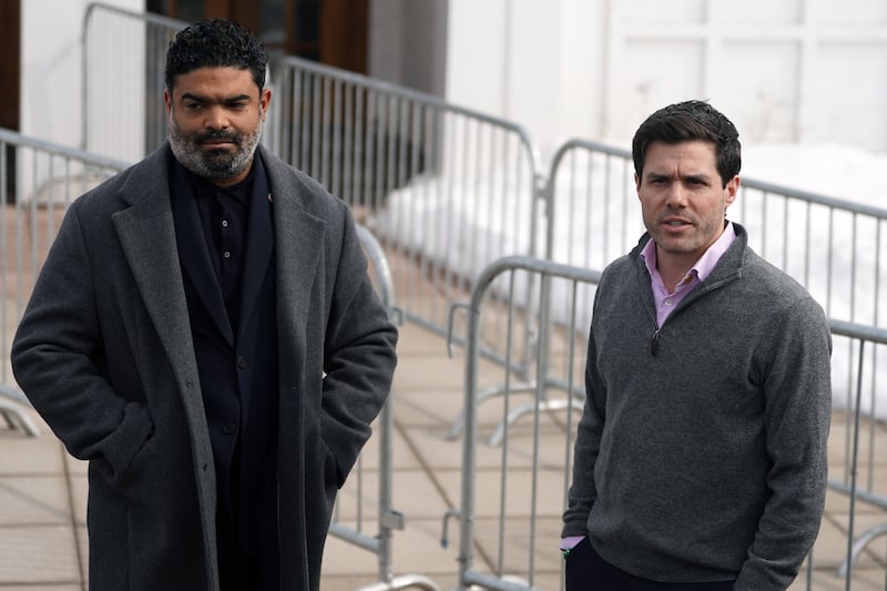Cinton adviser Nick Merrill (right) advises the media that testimony of Hillary Clinton was paused momentarily because images of the closed-door deposition with House Oversight Committee Republicans were leaked.