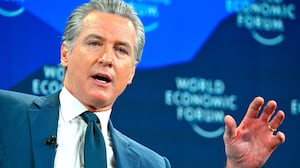 Gavin Newsom gestures as he speaks during the World Economic Forum (WEF) annual meeting in Davos on January 22, 2026.