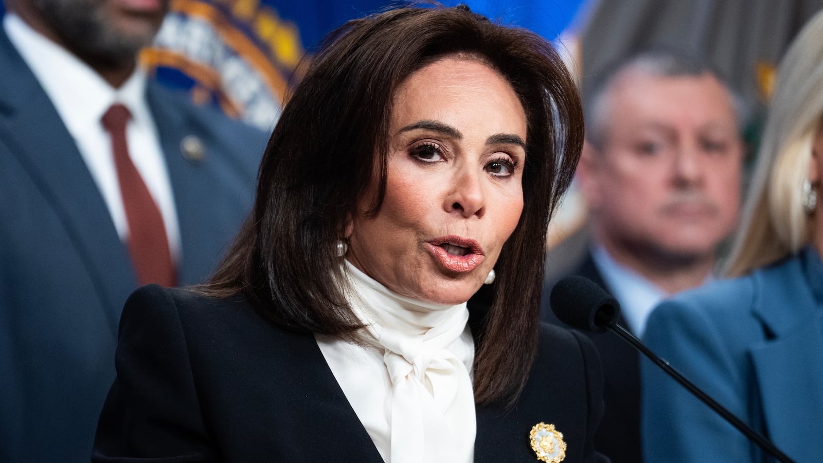 Jeanine Pirro, the U.S. attorney for Washington, D.C., conducts a news conference at the Department of Justice on Thursday, December 4, 2025, announcing the arrest of Brian Cole Jr., who allegedly placed pipe bombs near the Republican and Democratic National Committee offices on January 6, 2021.