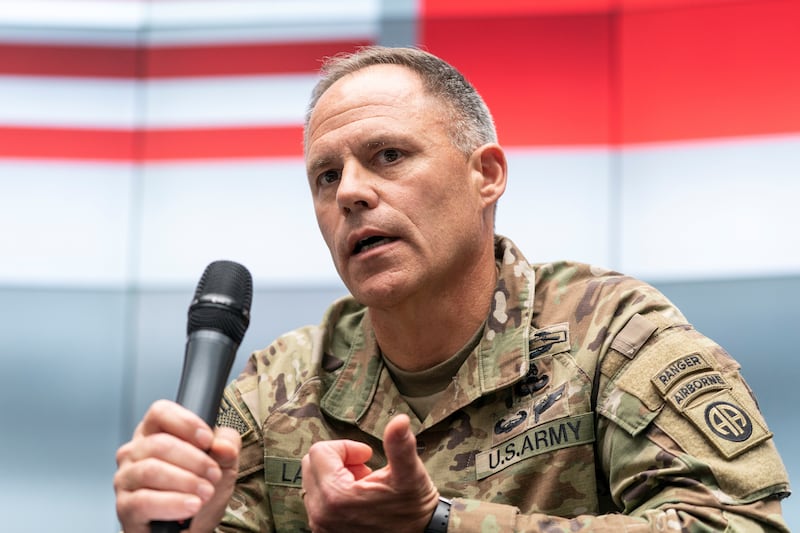 Christopher LaNeve speaks with reporters in Poland near the Ukraine border, April 24, 2022.