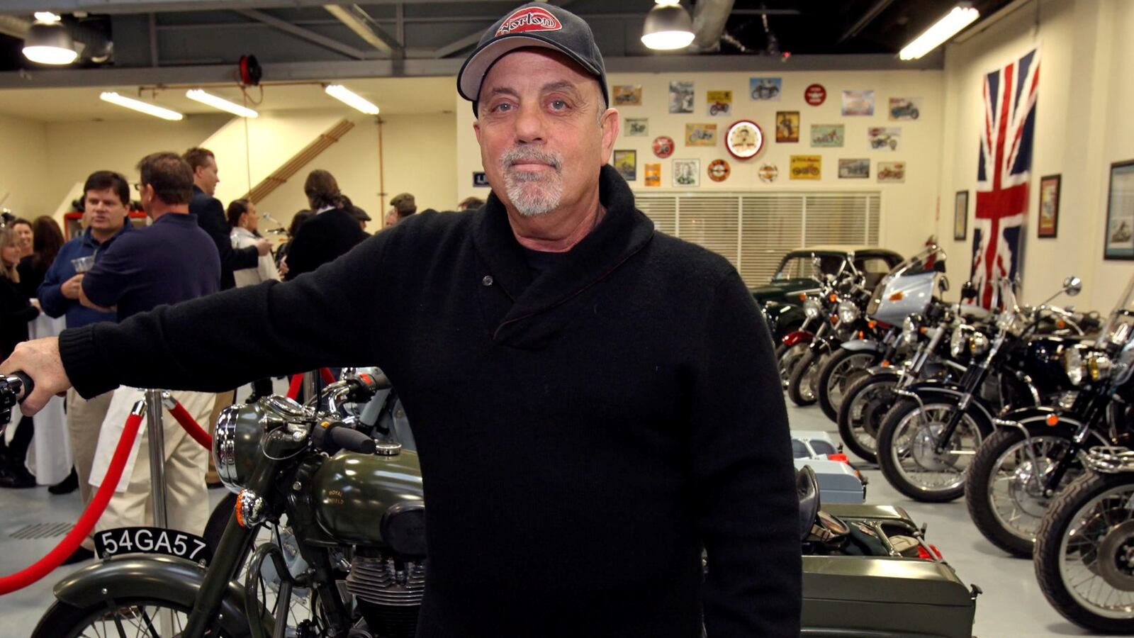 Billy Joel in his motorcycle shop.