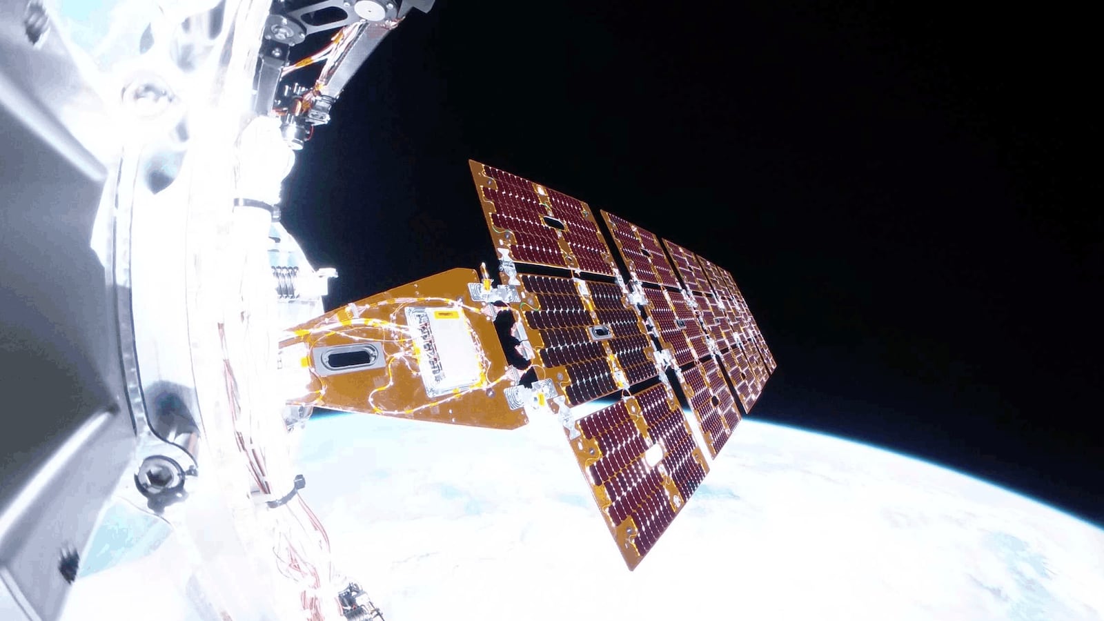 A view of the Link spacecraft over Earth.