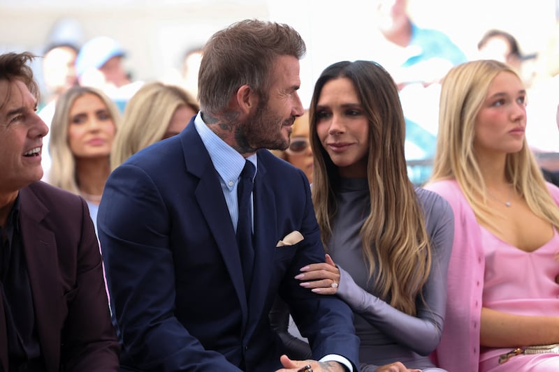 David Beckham attends his star unveiling ceremony on the Hollywood Walk of Fame, accompanied by his wife Victoria Beckham in Los Angeles, California, U.S., June 12, 2026. REUTERS/Mario Anzuoni