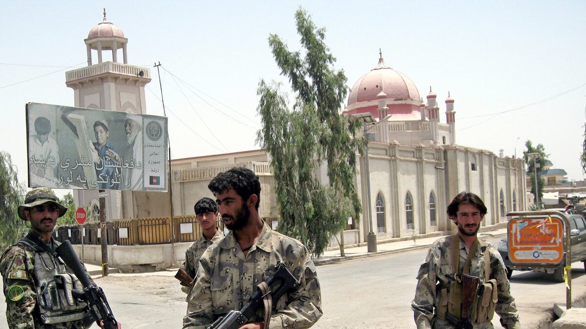 articles/2011/07/14/the-fallout-from-the-murder-of-ahmed-wali-karzai/afghanistan-suicide-bombing-karzai-moreau_pbanbx