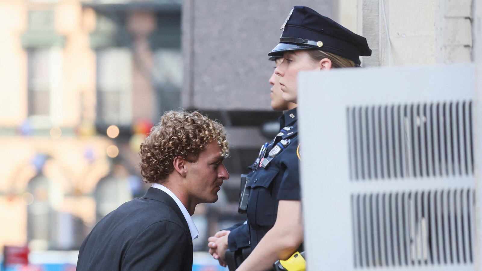 Former U.S. Marine Daniel Penny arrives at a New York City Police precinct to surrender for the death of Jordan Neely in New York City, May 12, 2023.