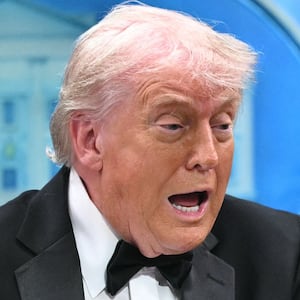 US President Donald Trump speaks flanked by FBI Director Kash Patel during a press briefing in the Brady Briefing Room at the White House