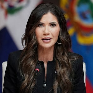 Kristi Noem delivers remarks at a working lunch at the Shield of the Americas Summit at Trump National Doral Miami, in Doral, Florida, U.S., March 7, 2026.