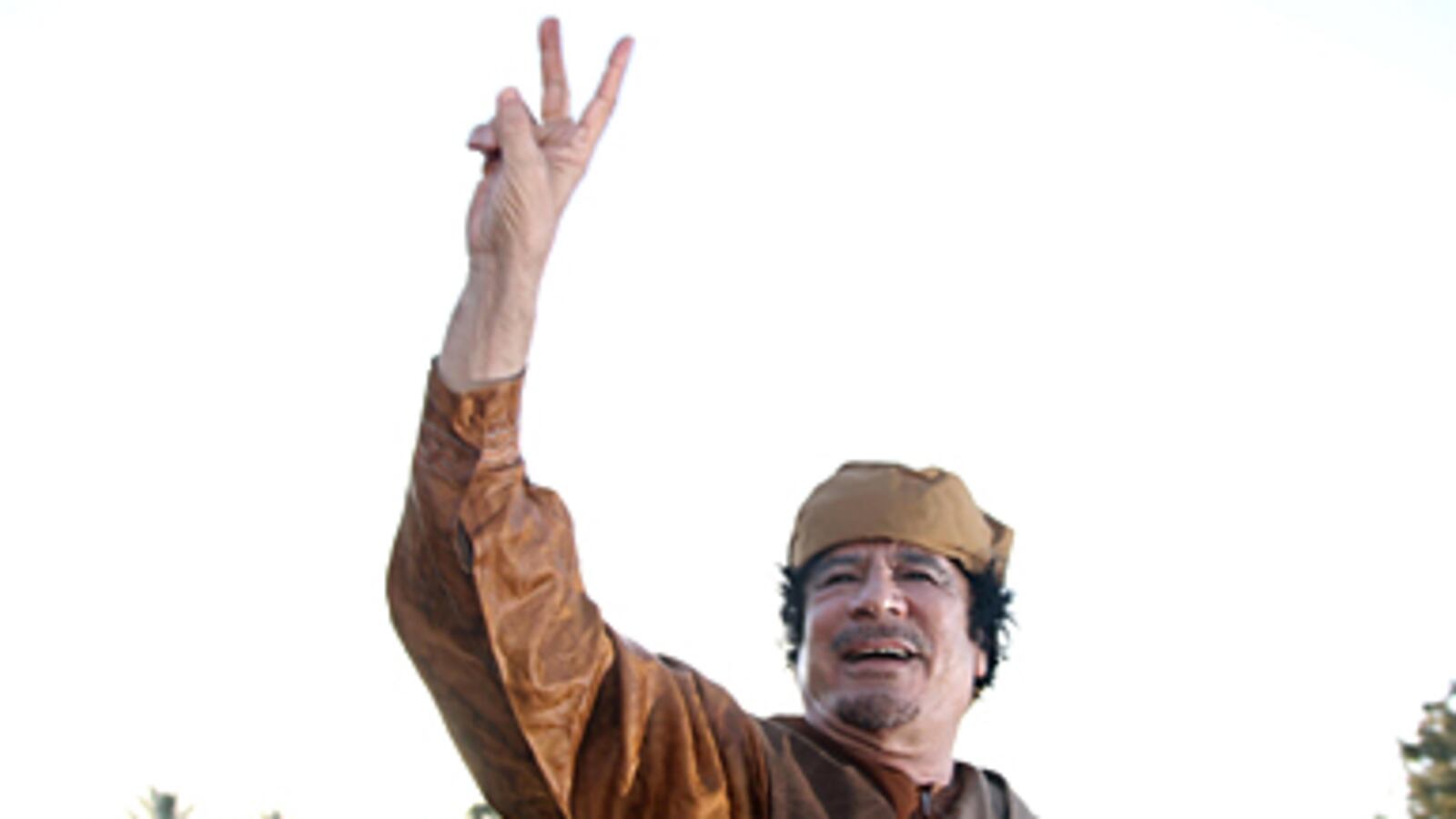 cheats/2011/04/24/gaddafi-still-has-access-to-money/gaddafi-free-elections_frmn04