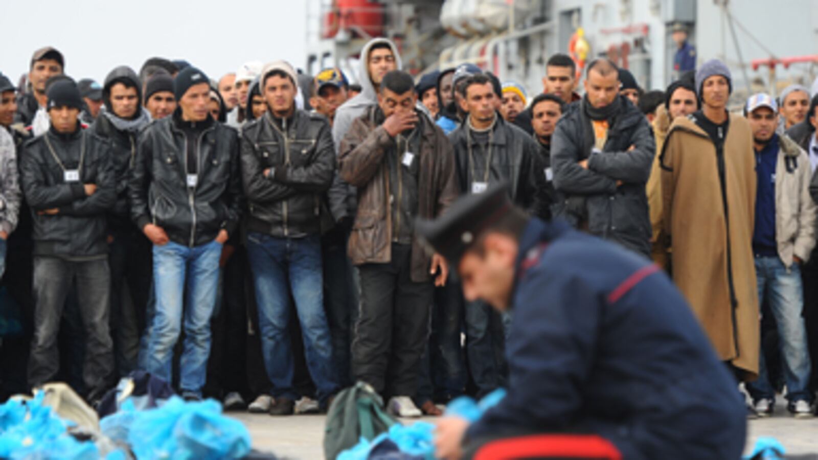 articles/2011/03/21/italys-libyan-refugee-camp-horror/nadeau-lampedusa_168133_sc03fe