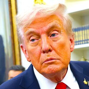 President Donald Trump listens to a question from a reporter after announcing a deal with Pfizer to lower Medicaid drug prices in the Oval Office of the White House on September 30, 2025 in Washington, DC. T