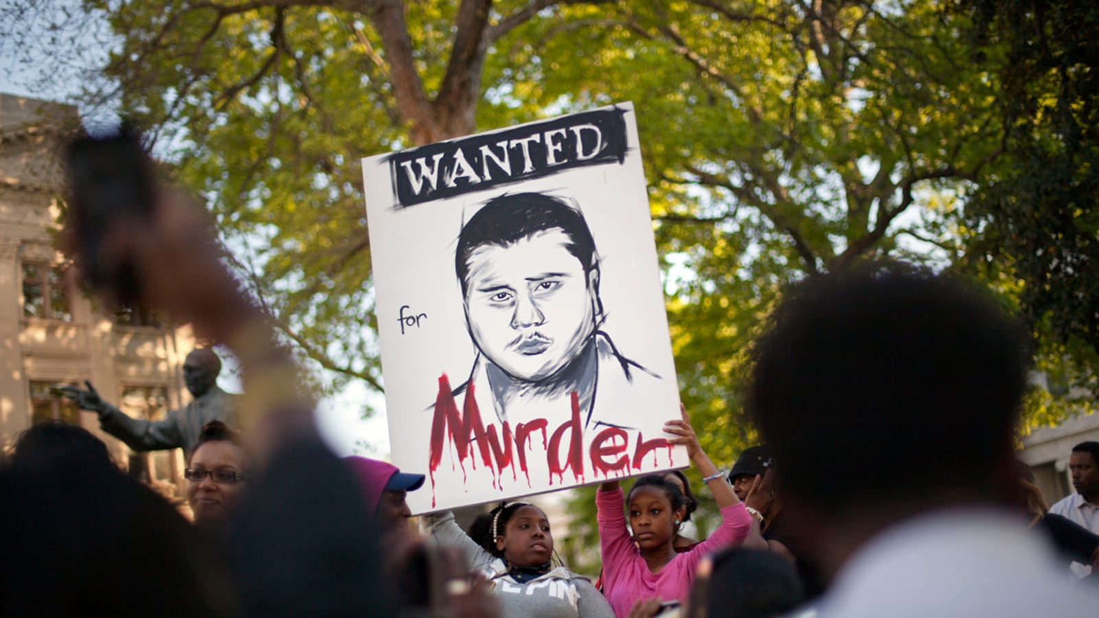 cheats/2012/04/12/poll-35-percent-of-whites-think-trayvon-s-death-unjust/george-zimmerman-sign-cheat_ry1h2k