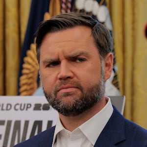 WASHINGTON, DC - AUGUST 22:   Vice President JD Vance looks at U.S. President Donald Trump as he talks in the Oval Office  August 22, 2025 in Washington, DC.  Trump announced the FIFA World Cup 2026 draw will take place at The Kennedy Center.   (Photo by Chip Somodevilla/Getty Images)