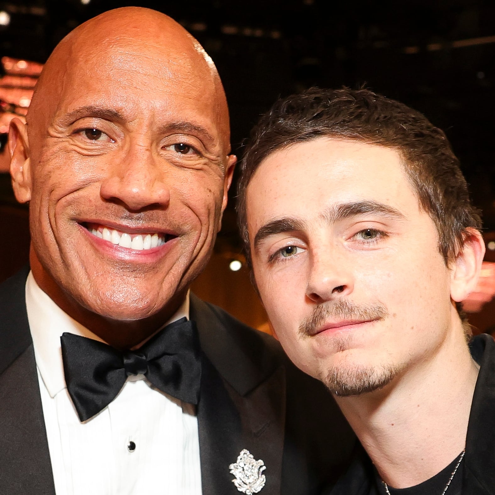 Dwayne Johnson and Timothée Chalamet attend the 83rd Annual Golden Globe Awards