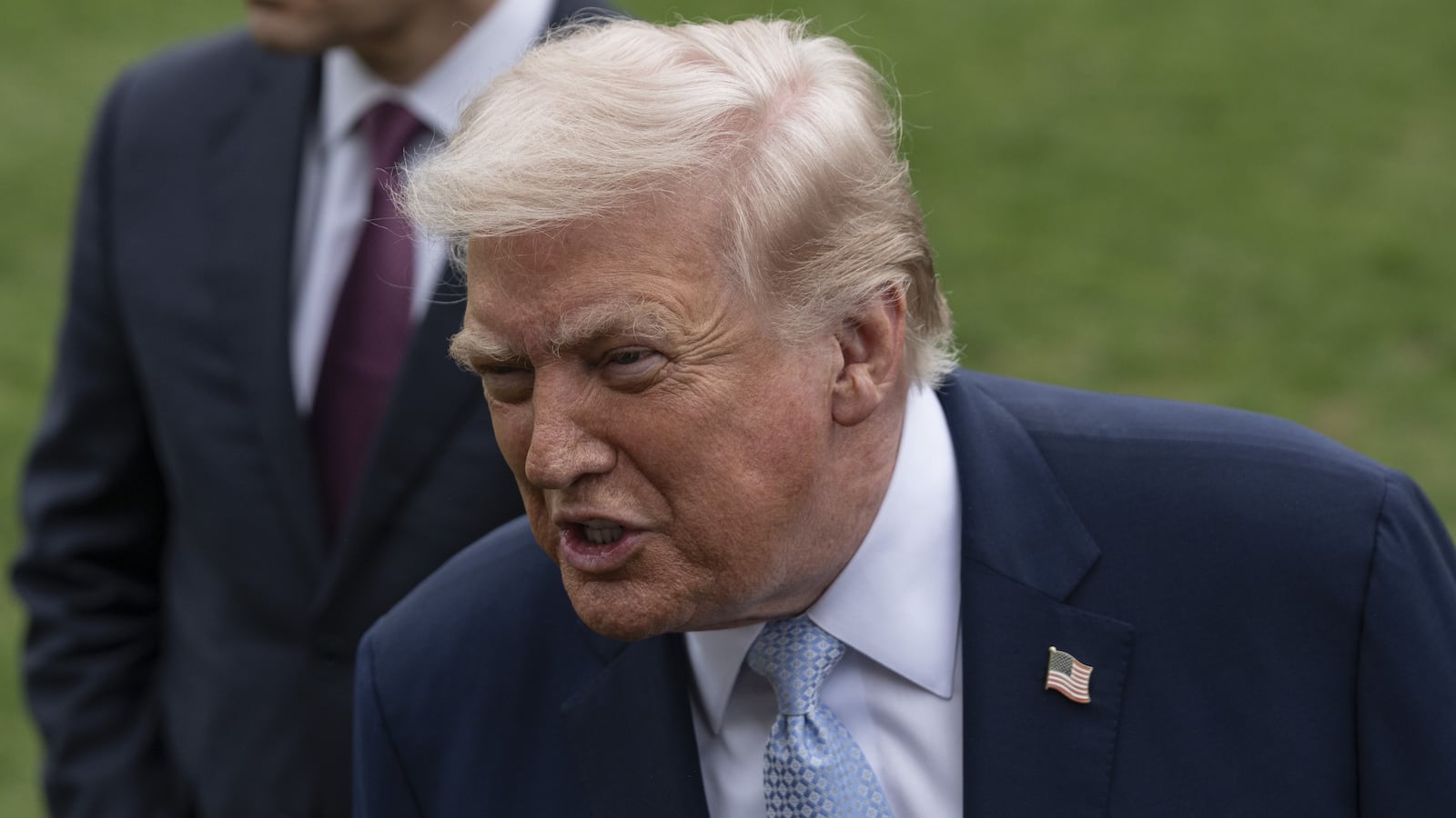 WASHINGTON DC, UNITED STATES - MARCH 20: United States President Donald Trump (R) speaks to the press before his departs the White House en route Miami, Florida on March 20, 2026, in Washington DC. Also The United States Secretary of State Marco Rubio (L) is seen. (Photo by Celal Gunes/Anadolu via Getty Images)