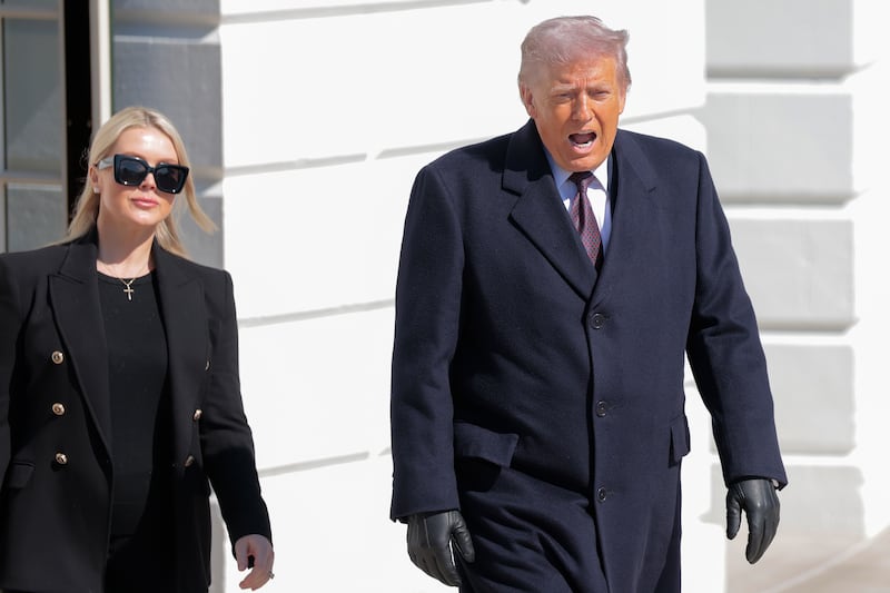 U.S. President Donald Trump departs the White House alongside White House Press Secretary Karoline Leavitt (L) and boards Marine One on the South Lawn on February 27, 2026 in Washington, DC.