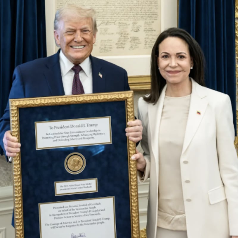 Venezuelan opposition leader Maria Corina Machado presents Donald Trump with her Nobel Peace Prize.