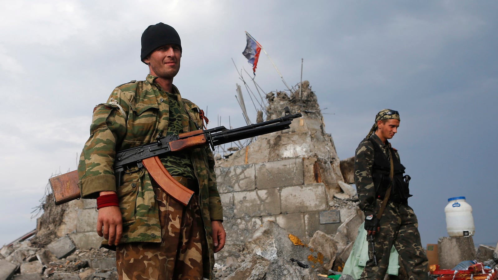 articles/2014/09/04/defying-nato-ignoring-ceasefire-russian-backed-troops-keep-rolling/140904-phillips-russia-invasion-tease_y9eb1z