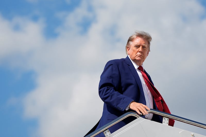 Trump boards Air Force One at Joint Base Andrews on Friday, Aug. 7, 2026.