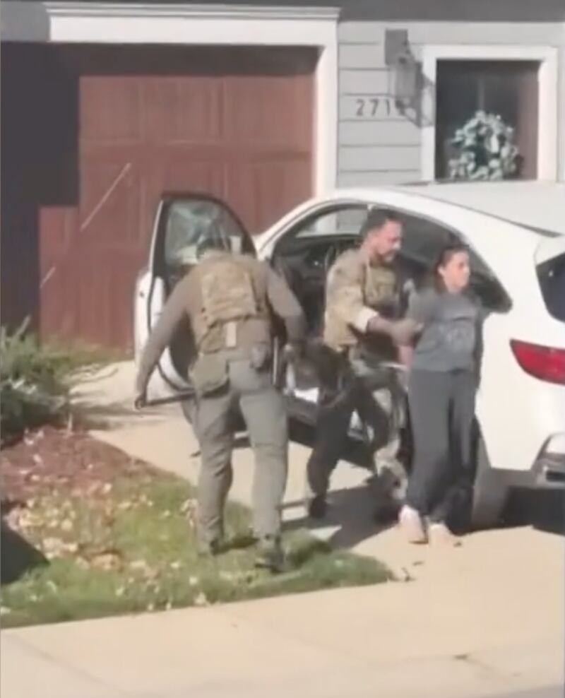 Border Patrol detain one of the women for alerting others to their presence.