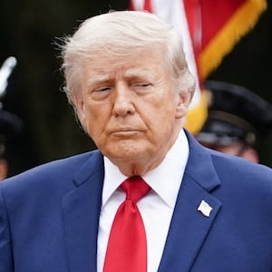 U.S. President Donald Trump, U.S. Vice President JD Vance and U.S. Secretary of Defense Pete Hegseth participate in a wreath-laying ceremony at the Tomb of the Unknown Soldier as part of a Memorial Day event at Arlington National Cemetery, Arlington, Virginia, U.S., May 25, 2026. REUTERS/Nathan Howard