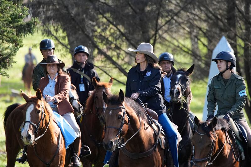Noem and Argentine National Security Minister Patricia Bullrich ride horses during a visit to Campo De Mayo Military Base in July.