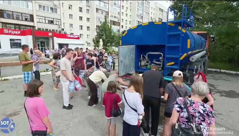 People line up for fresh water in the Siberian city of Tymen.