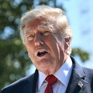 US President Donald Trump speaks to the press about ongoing construction of a helipad and other projects on the South Lawn of the White House in Washington, DC, on August 19, 2026.