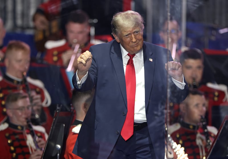 U.S. President Donald Trump dances after speaking during a rally to kick off the Great American State Fair on the National Mall in Washington, DC.