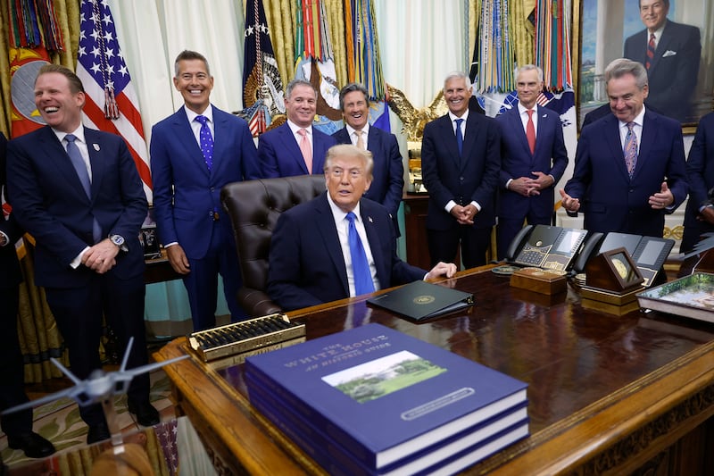 WASHINGTON, DC - SEPTEMBER 02: U.S. President Donald Trump, joined by (L-R) Executive Director for the White House Task Force on the FIFA World Cup 2026 Andrew Giuliani, Transportation Secretary Sean Duffy, President and CEO of U.S. Travel Association Geoff Freeman, CEO of MGM Resorts International William Hornbuckle, President and CEO of Hilton Worldwide Chris Nassetta and American Airlines CEO Robert Isom takes questions from the media during a meeting with U.S. travel executives in the Oval Office of the White House on September 02, 2026 in Washington, DC. President Trump met with executives from travel companies including American Airlines, Marriott, MGM Resorts, Carnival, Caesars Entertainment, Hard Rock International, Venetian, and Raffles & Fairmont. (Photo by Kevin Dietsch/Getty Images)
