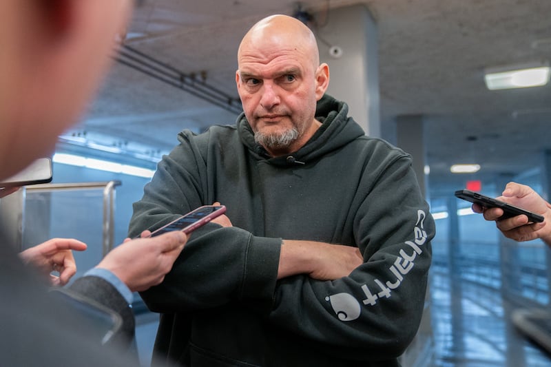 Senator John Fetterman speaking to reporters on Capitol Hill on January 9 as current and former staffers have sounded the alarms over his mental health.