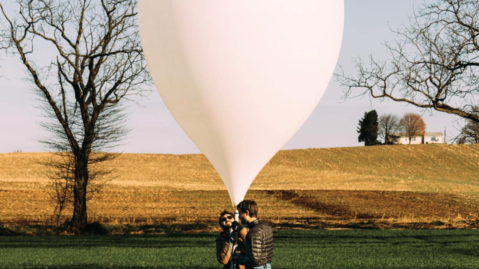 Members of Near Space Labs launch a stratospheric balloon with a Swift robot.