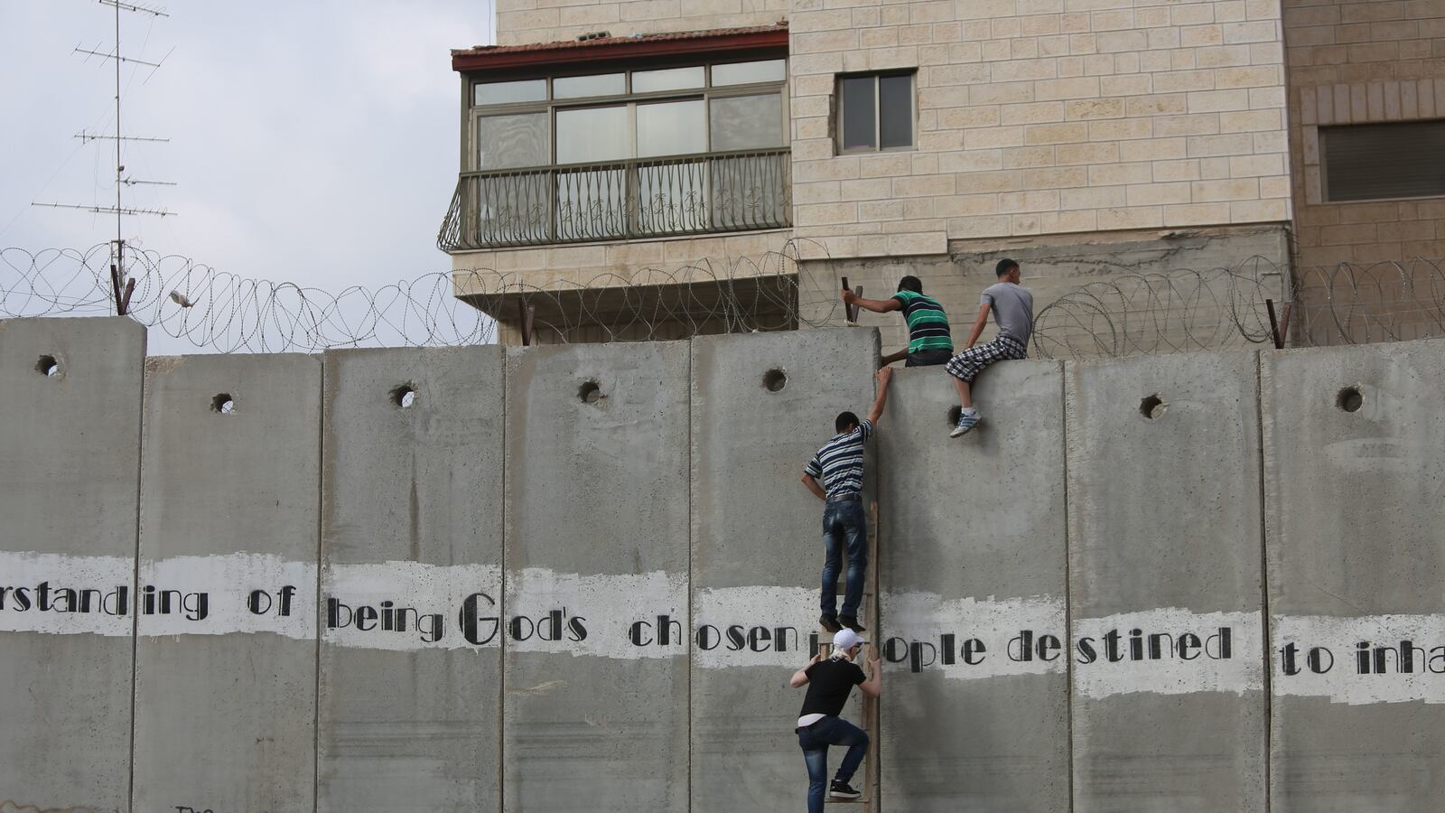 articles/2013/07/12/the-first-friday-of-ramadam-for-palestinians/climbing-wall-openz_dwvfr4