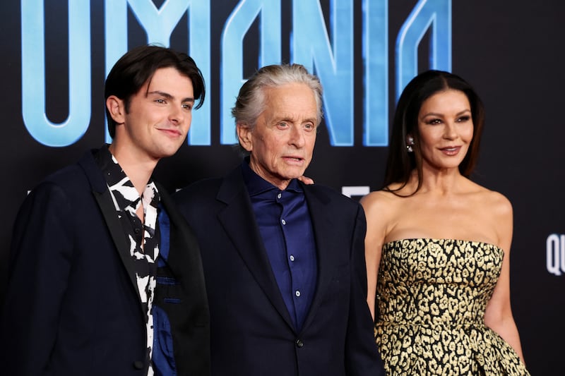 Michael Douglas, Catherine Zeta-Jones and their son Dylan Michael Douglas pose at a premiere for the film “Ant-Man and the Wasp: Quantumania” in Los Angeles, California, U.S., February 6, 2023.