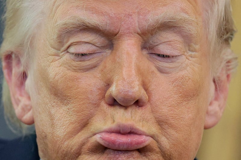 U.S. President Donald Trump speaks as he attends Markwayne Mullin's swearing-in as Department of Homeland Security (DHS) Secretary, at the White House in Washington, D.C., U.S., March 24, 2026.
