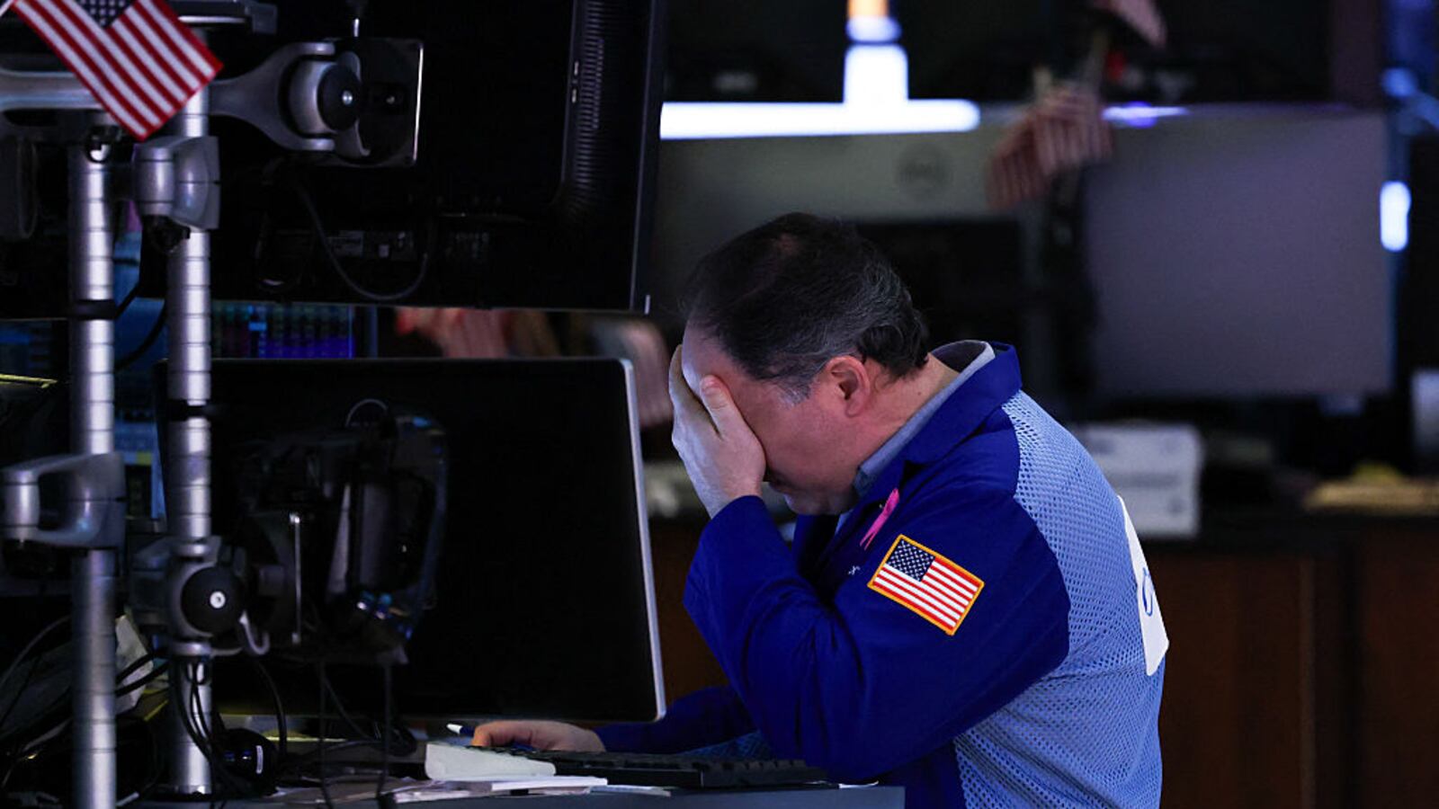 A trader works on the floor of the New York Stock Exchange (NYSE) at the opening bell in New York City, on April 16, 2025.