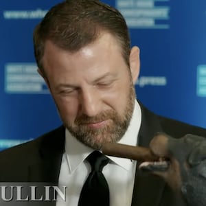 Markwayne Mullin, his wife, and Triumph the Insult Comic Dog.