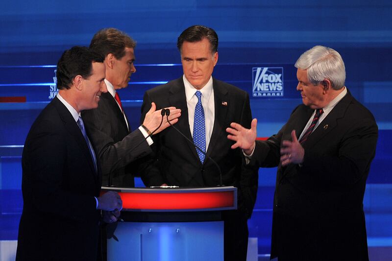 articles/2012/01/17/election-oracle-non-mitts-land-hits/opponents-atack-romney-debate-jan-16-cheat_ell0xq