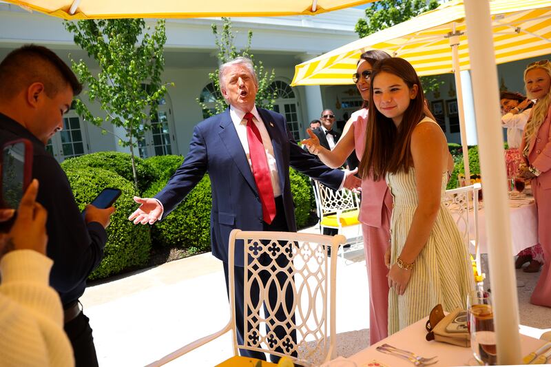 President Donald Trump demands they turn up the music after delivering remarks during a Mother's Day luncheon with Angel Moms and Gold Star Mothers in the Rose Garden at the White House on May 08, 2026.