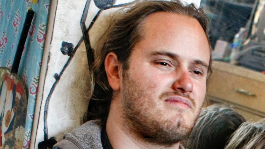 David DePape smirks in 2013.