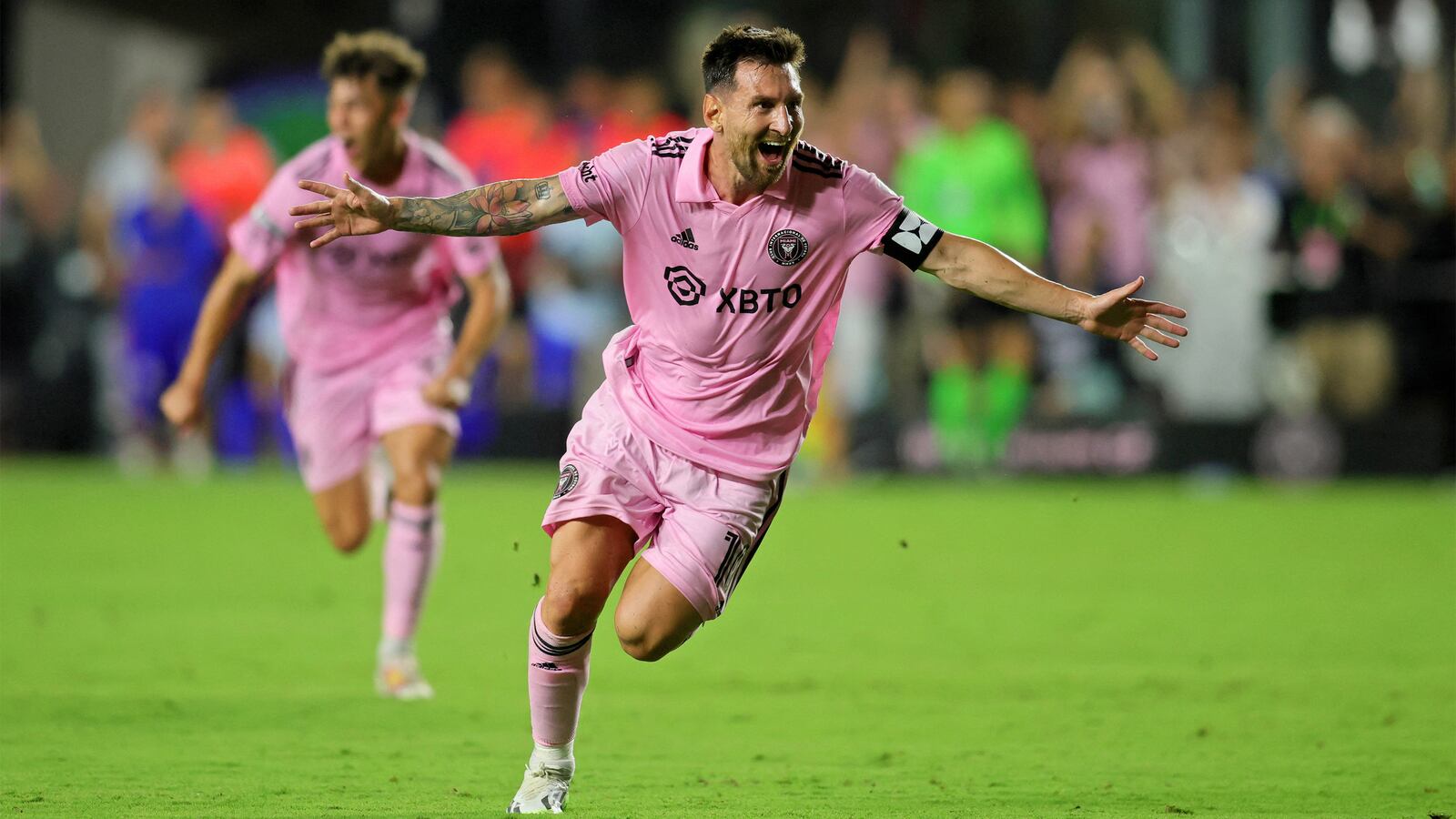 Photo of Inter Miami CF forward Lionel Messi celebrating after scoring a goal.
