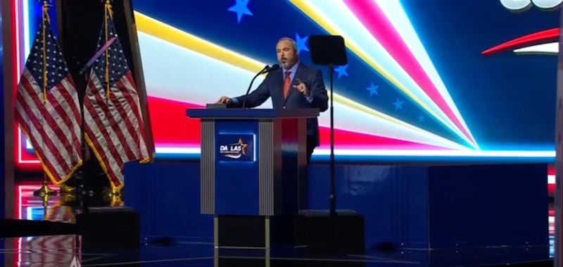 The 'L' falls off the 'Dallas' sign at the Republican Convention RNC chairman a Joe Gruters speaks.