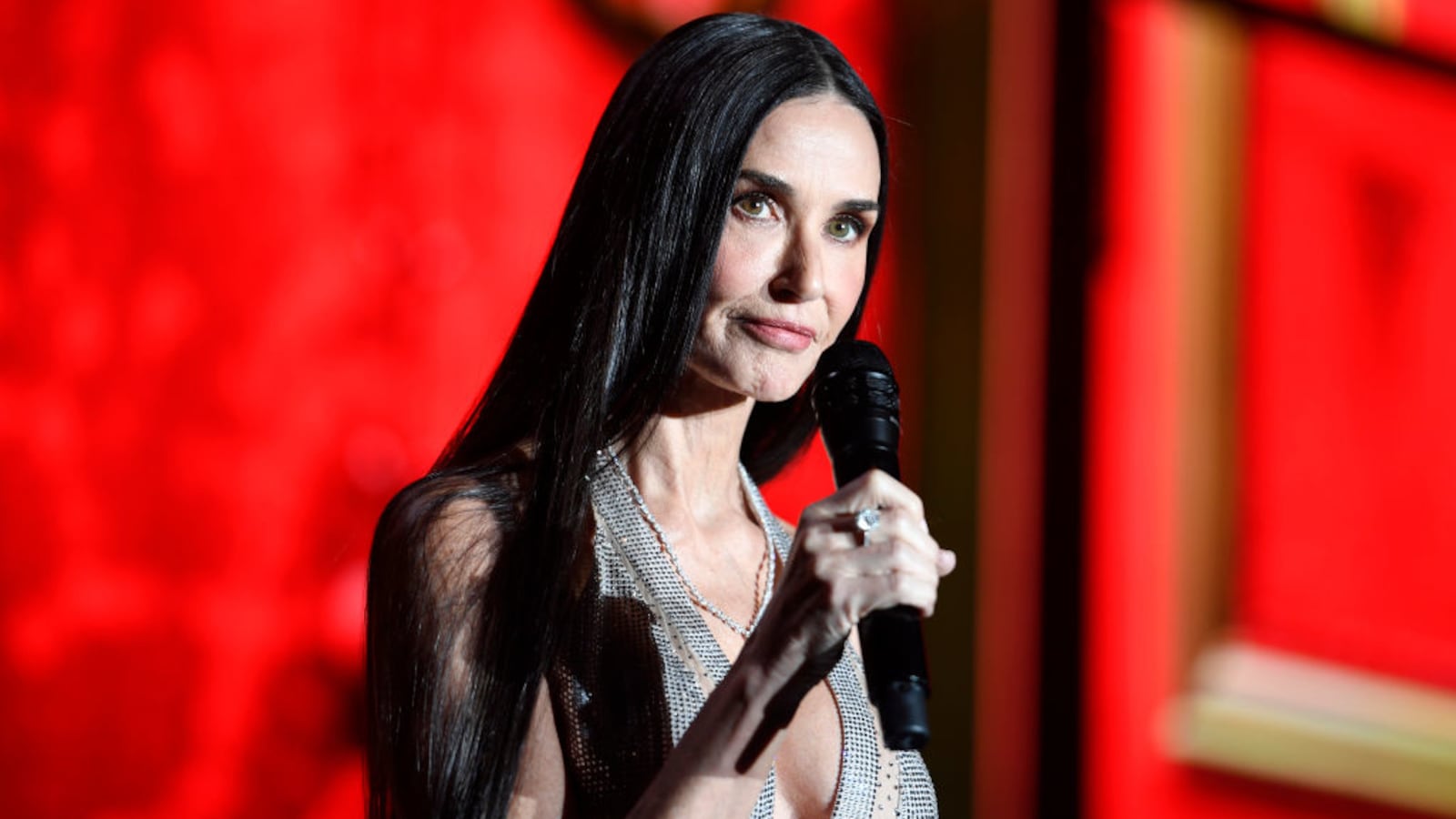 Demi Moore called out an audience member while she introduced Cher at the amfAR Cannes Gala in France.