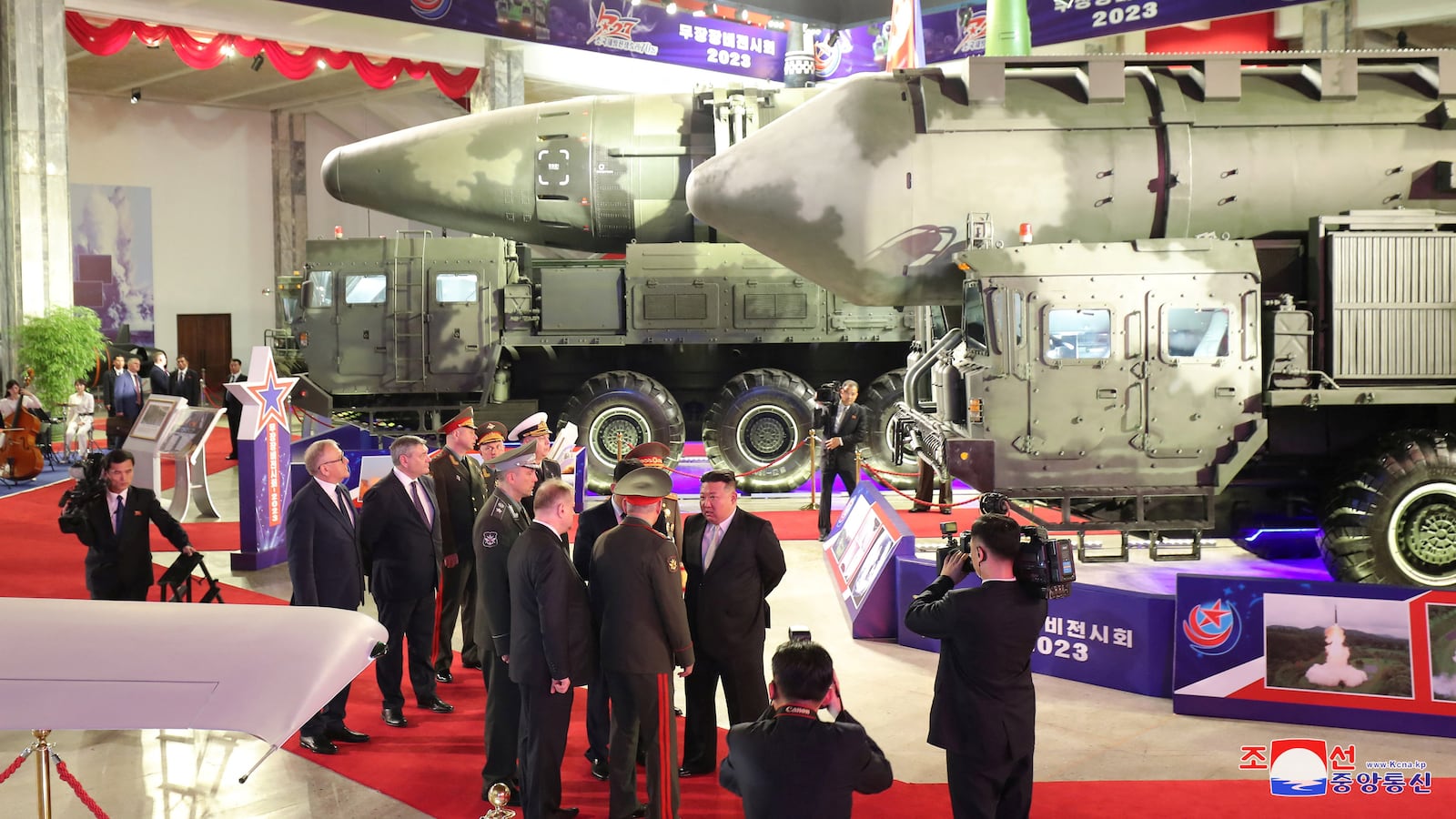 North Korean leader Kim Jong Un and Russia's Defense Minister Sergei Shoigu visit an exhibition of armed equipment in this image released by North Korea's Korean Central News Agency on July 27, 2023.