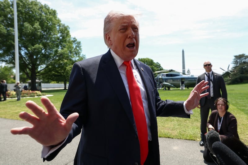 U.S. President Donald Trump speaks to reporters as he departs the White House in Washington, D.C., U.S., May 1, 2026. REUTERS/Kevin Lamarque