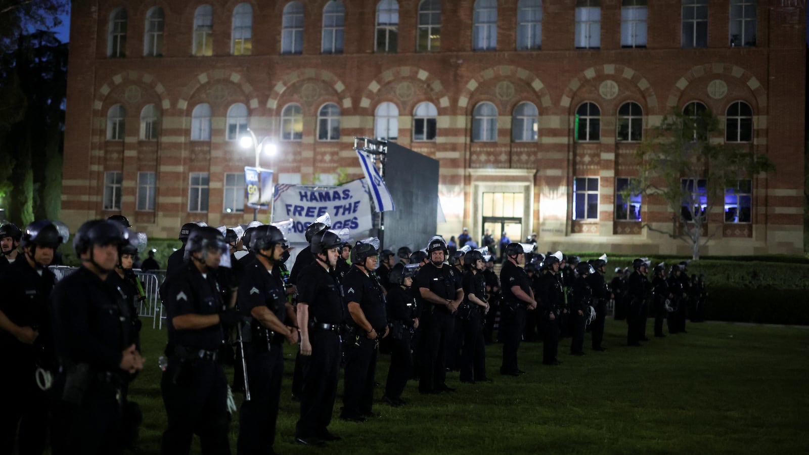 Law enforcement officers take position before entering the pro-Palestinian protest encampment at UCLA, as the conflict between Israel and the Palestinian Islamist group Hamas continues, in Los Angeles, California, U.S., May 1, 2024.