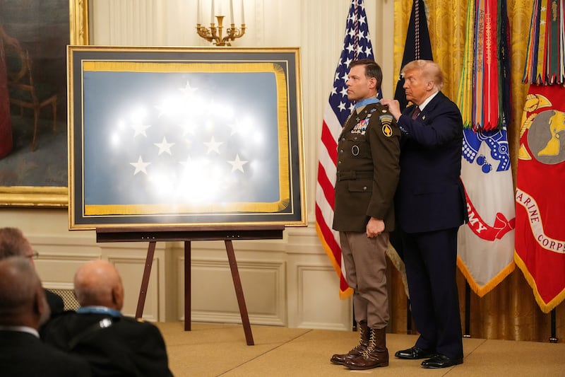 U.S. President Donald Trump awards retired U.S. Army Major Nicholas Dockery the Medal of Honor during a ceremony at the White House in Washington, D.C., U.S., June 18, 2026.