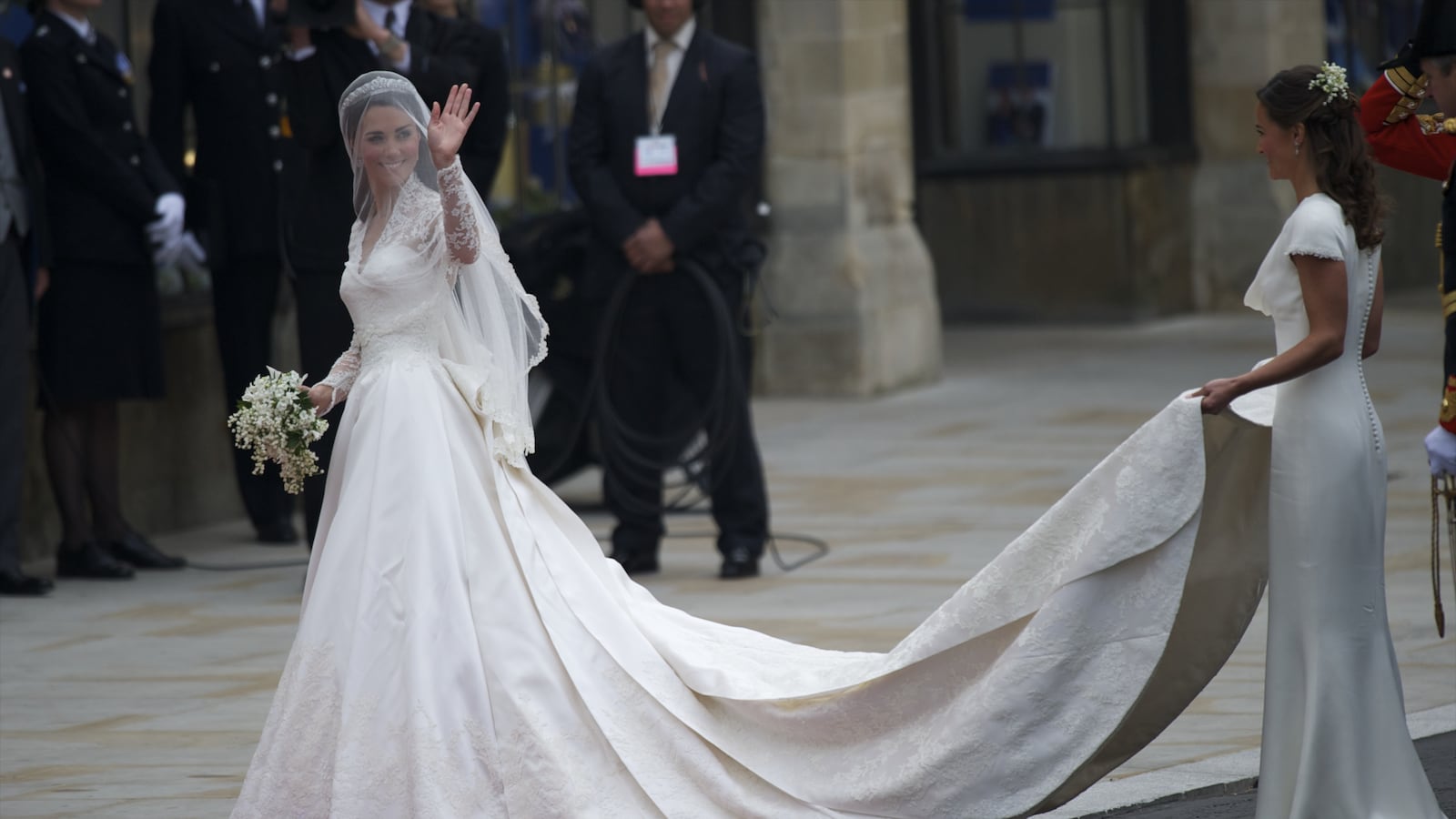 Kate Middleton arrives at Westminster Abbey for her wedding to Prince William in her McQueen gown by Sarah Burton.